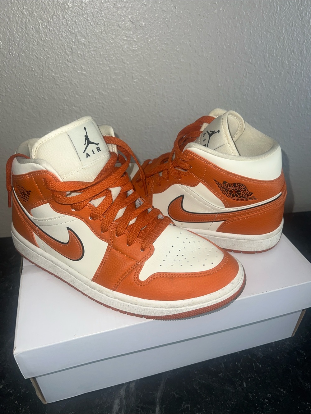 Nike Air Jordan mid Orange and White Mid-Top Sneakers with Swoosh